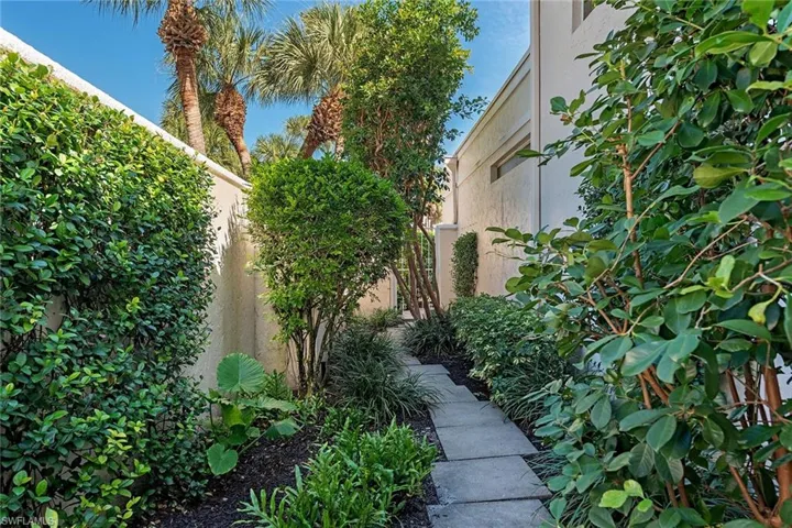 View of side of property with stucco siding