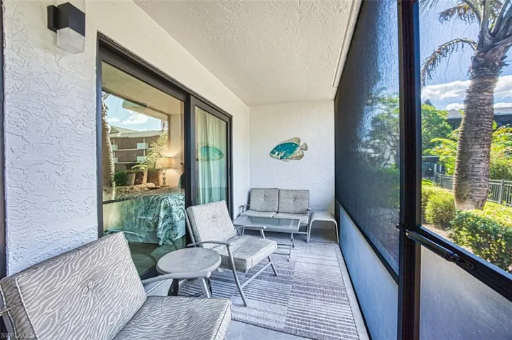 Sunroom featuring healthy amount of natural light