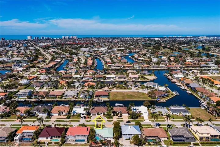 Bird's eye view with a water view and a residential view