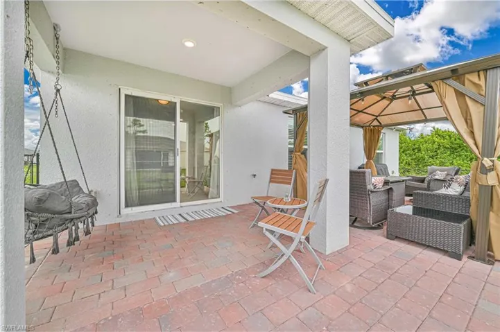 View of patio / terrace with a gazebo and an outdoor hangout area