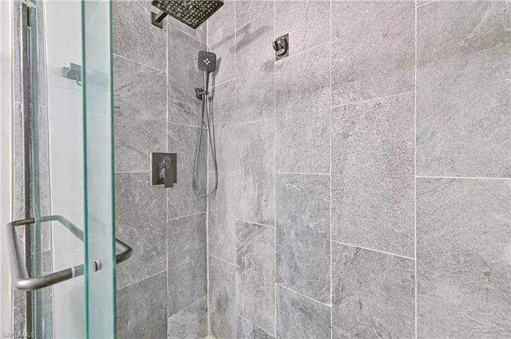 Bathroom featuring a shower stall