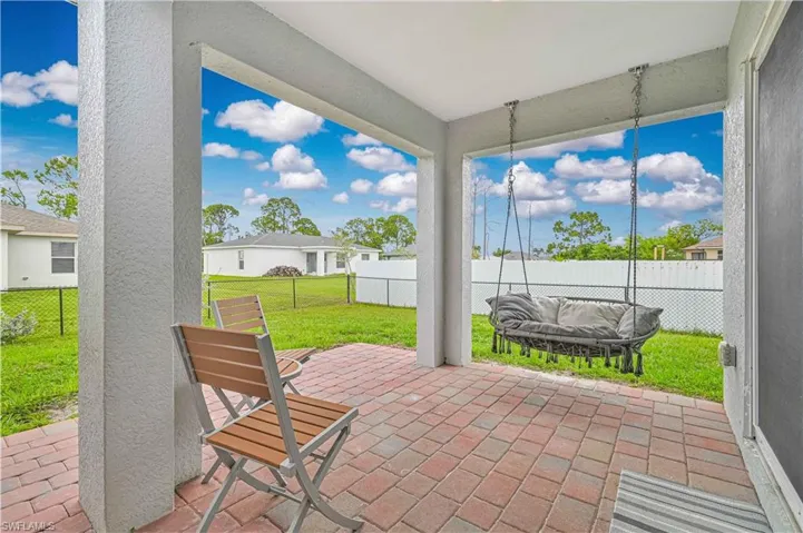 Fenced backyard featuring a patio area