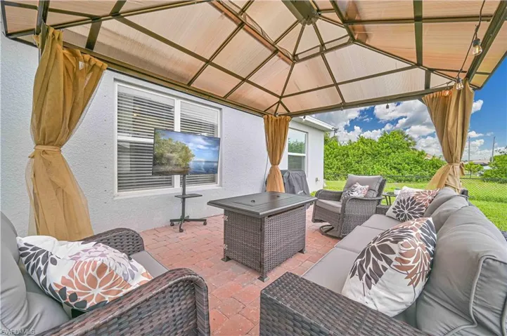 View of patio / terrace featuring outdoor lounge area and a gazebo