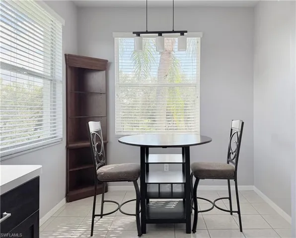 Eat in Kitchen Is Surrounded By Windows