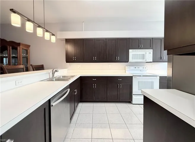 Large Kitchen With Updated Cabinets And Lighting