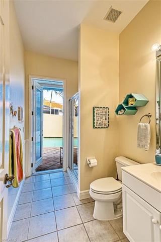 Guest bathroom opens to the pool area
