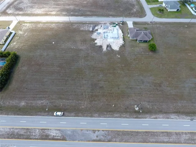 Aerial showing your lot opposite a newly constructed home.