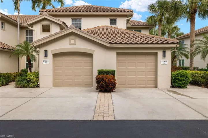 One car garage with 2 front parking spots.