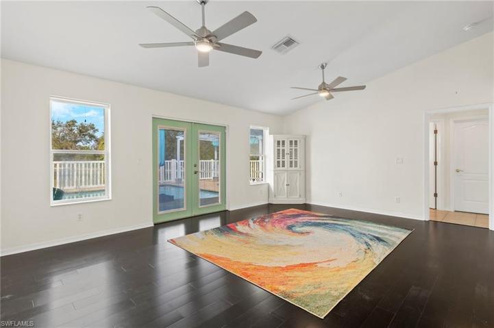 Great Room with french doors leading to pool.