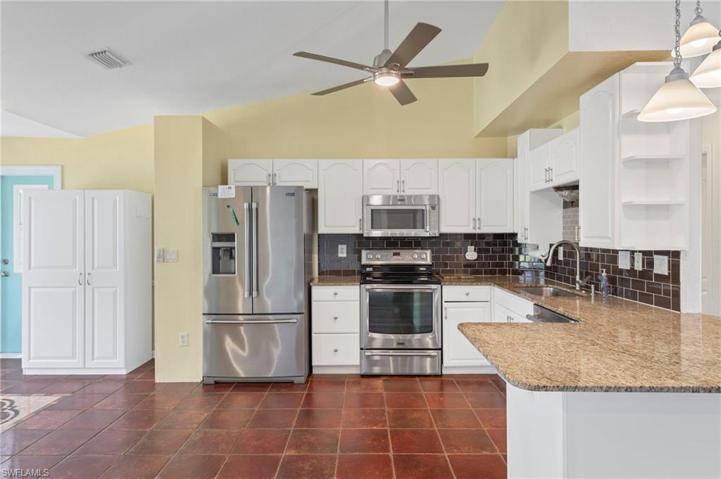 Vaulted ceilings and new lighting throughout the home.