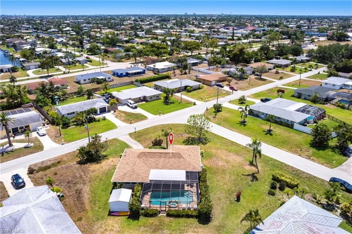 Aerial view of property with over size lot