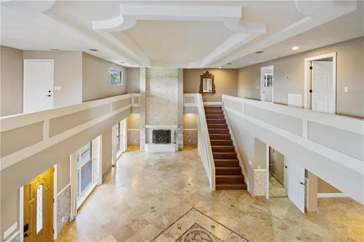 View of living room from upstairs loft