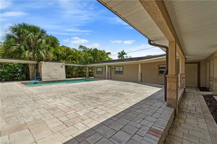 View of patio featuring an outdoor pool