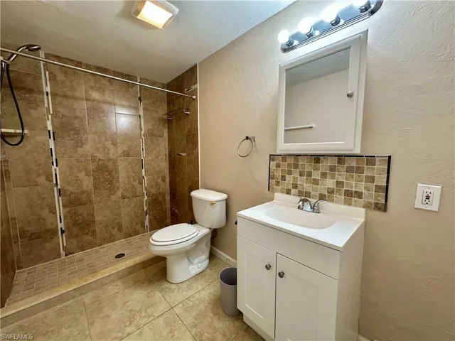 Bath with walk-in shower in Guest House #1