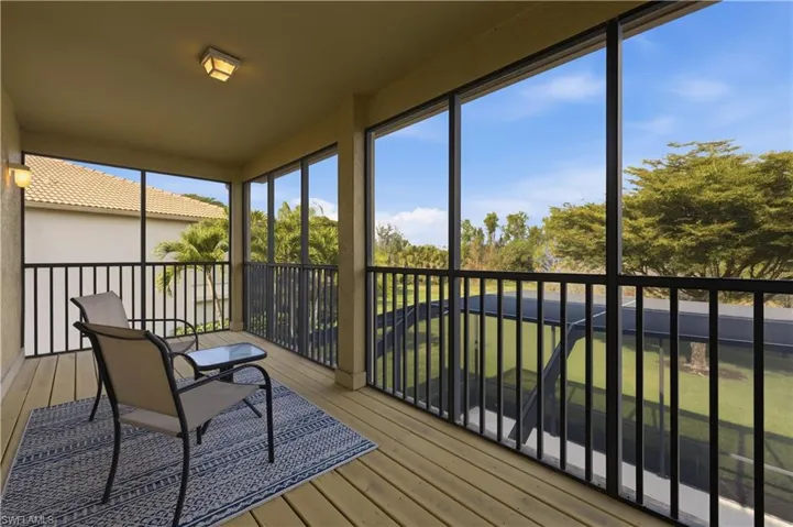 second story balcony overlooking the preserve and lake