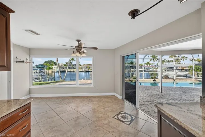 Dining area looking out on the water.  Imagine the entertaining you could do!