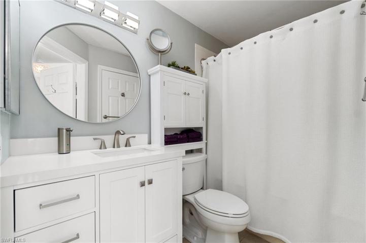Guest bath updated with new cabinets, sink, toilet and mirror. This is lovely bathroom