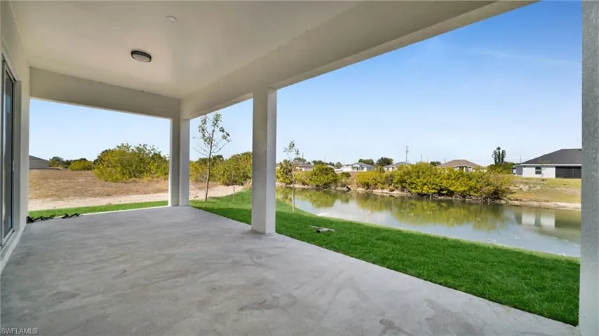 View of patio featuring a water view