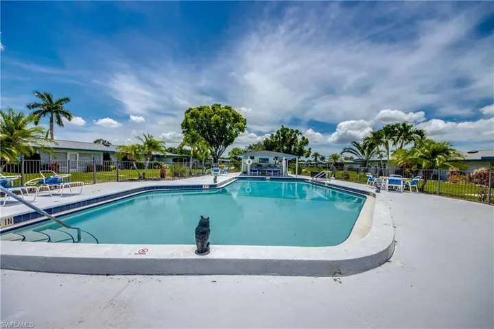 Community pool featuring a patio area