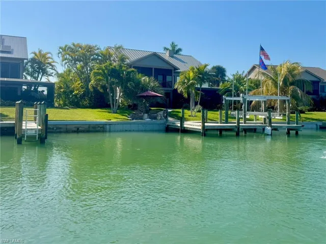 Dock featuring a water view
