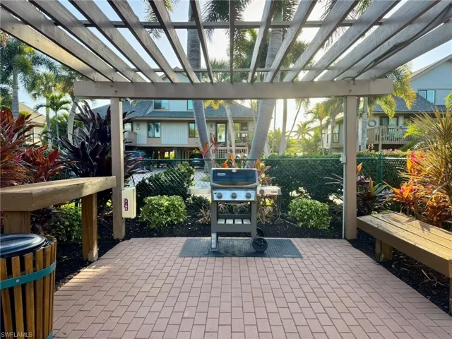 View of patio / terrace featuring grilling area and a pergola