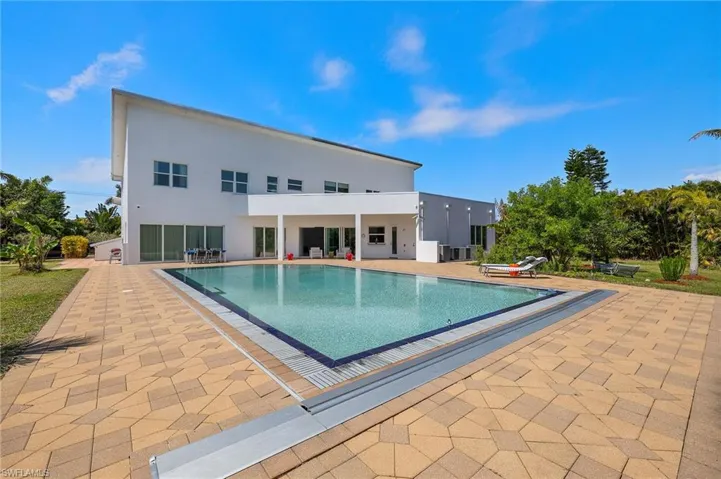 Pool with a patio area