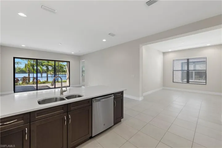 Kitchen showing living area
