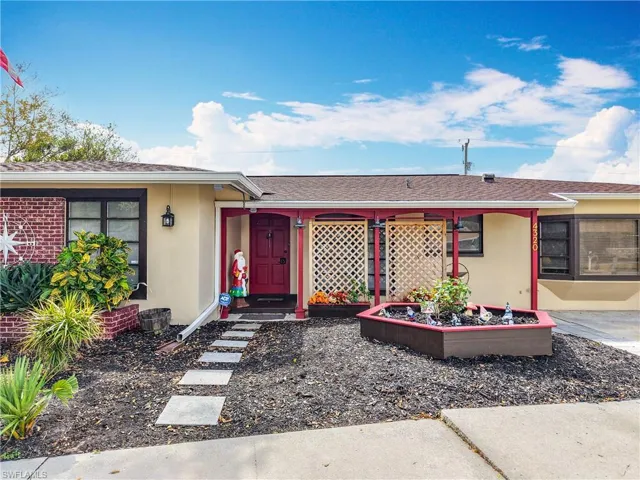 Single story home with stucco siding