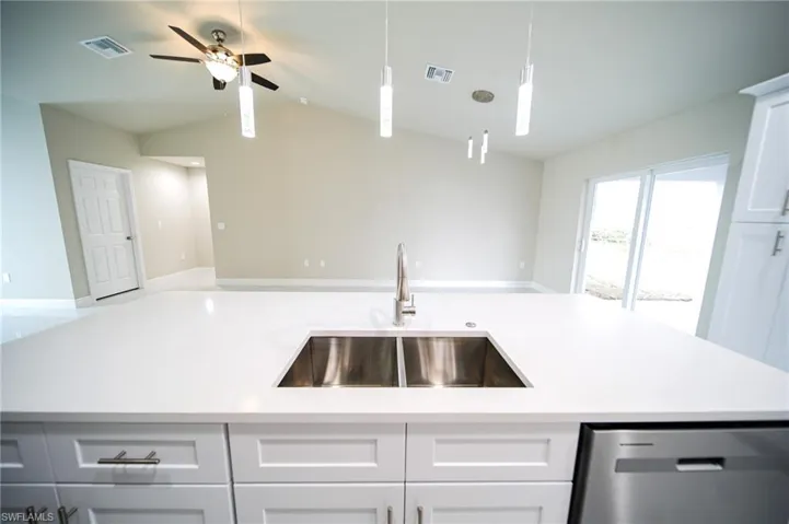 The Island Kitchen Comes With Quartz Countertops, Soft Touch White Wood Shaker Cabinets, Stainless Steel Appliances, Tile Backsplash, Floor To Ceiling Pantry, And Modern Lighting!