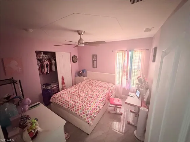 Recessed lighting, ceiling fan, and sliding closet doors