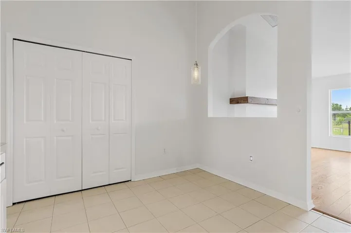 Pantry and plenty of room for a breakfast table.