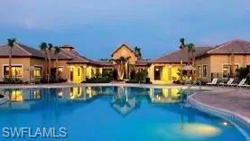 Community pool featuring a patio