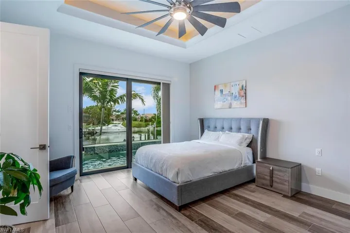 Primary Suite II with Pool and Canal View