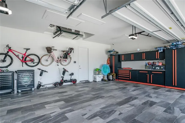 Spacious 3-car garage with tiles
