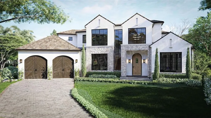 View of front of property featuring a front lawn