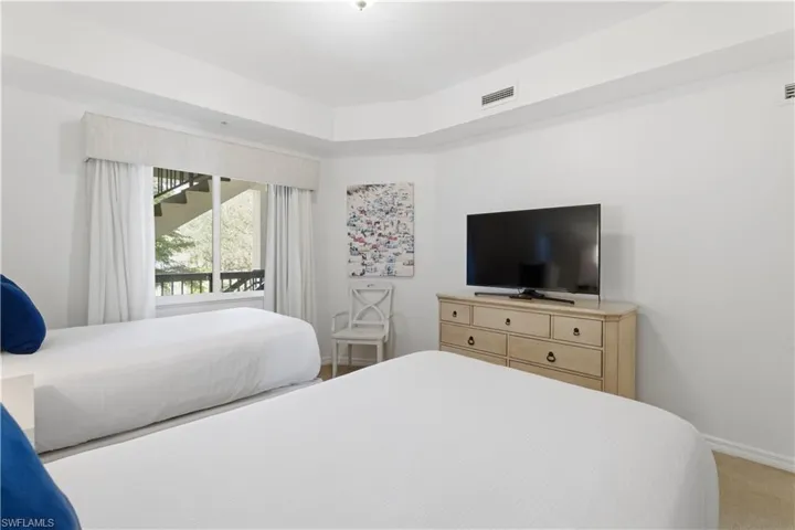 Bedroom with baseboards