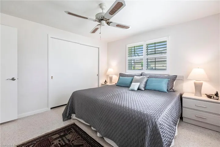 Bedroom with a closet and ceiling fan