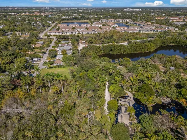 Aerial overview of property's location featuring a large body of water