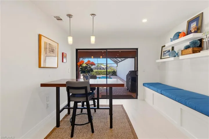 Dining room with baseboards and recessed lighting