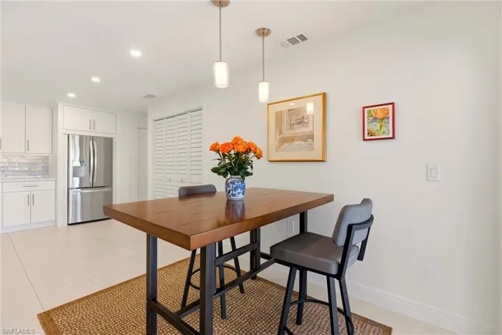 Dining area featuring recessed lighting and baseboards