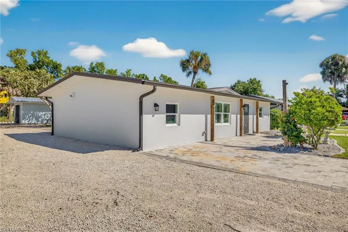 View of front of home featuring stucco siding