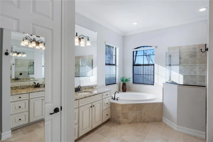 Private water closet, recessed lighting and crown molding throughout!