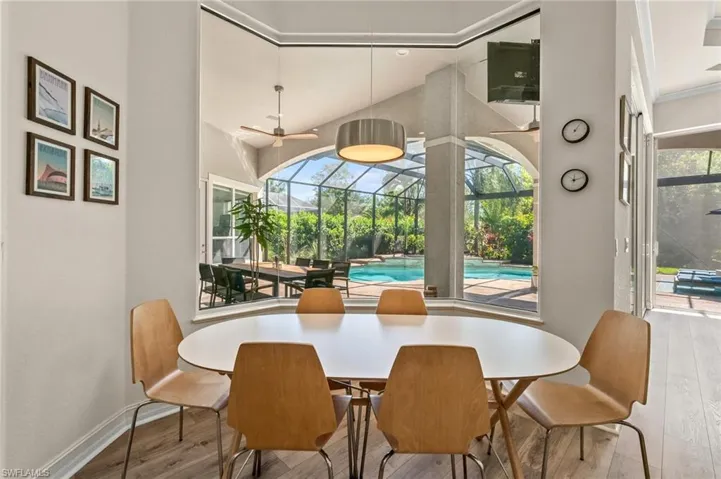 Dining area featuring a healthy amount of sunlight and light hardwood / wood-style floors