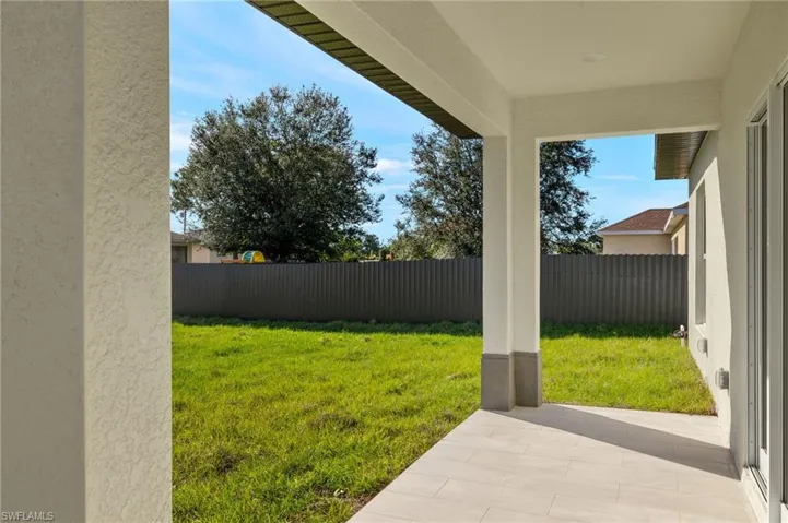 View of yard with a patio area