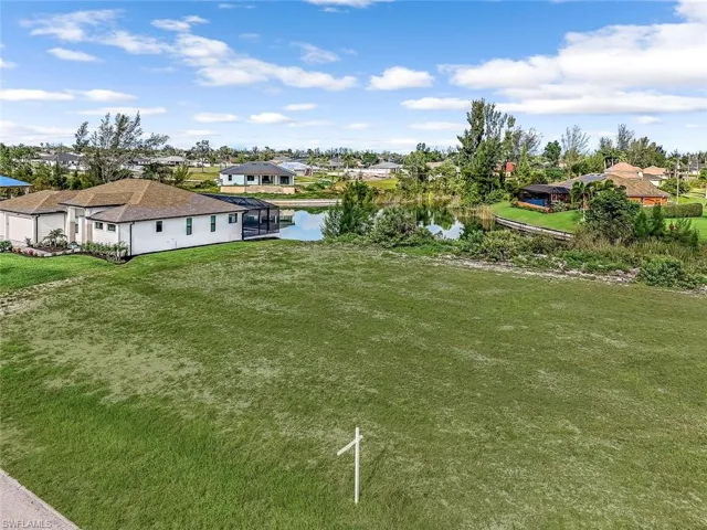 Large yard with water views.