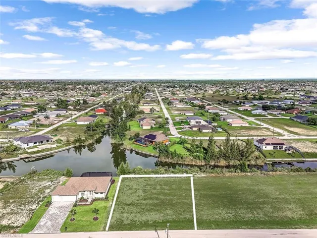 Spacious lot with canal view.