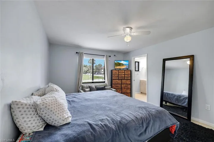 Primary suite features a large window and ensuite bathroom.