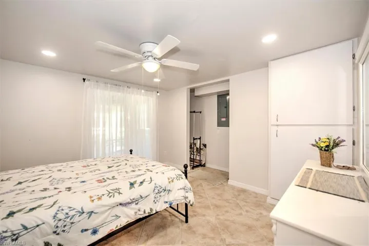 Bedroom featuring ceiling fan