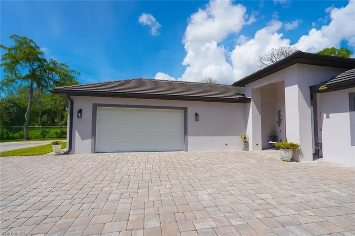 Garage with decorative driveway