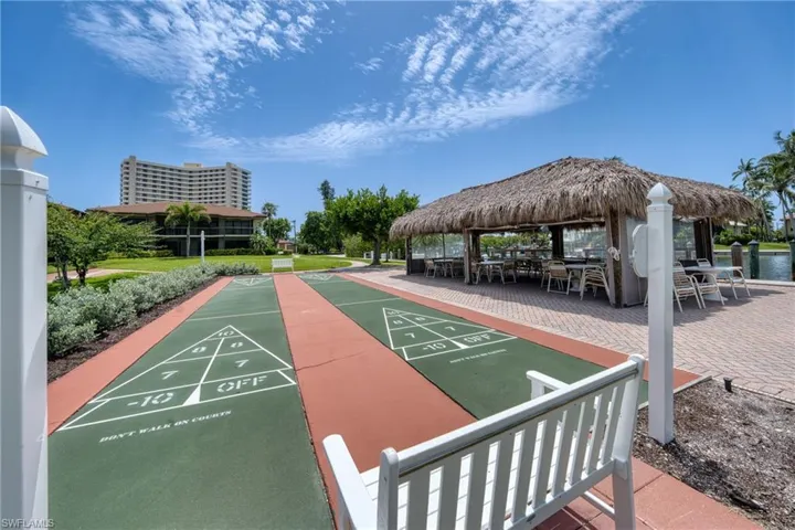 Surrounding community featuring a gazebo and shuffleboard